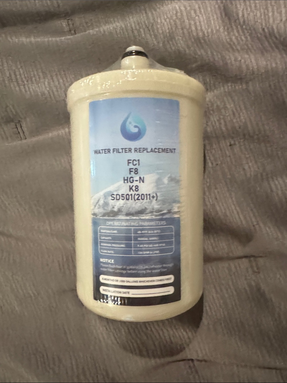 Universal Water Filter Replacement Cartridge in Cream with Blue Label